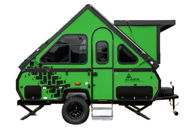 Green aliner off-road camper trailer parked with stabilizers deployed.