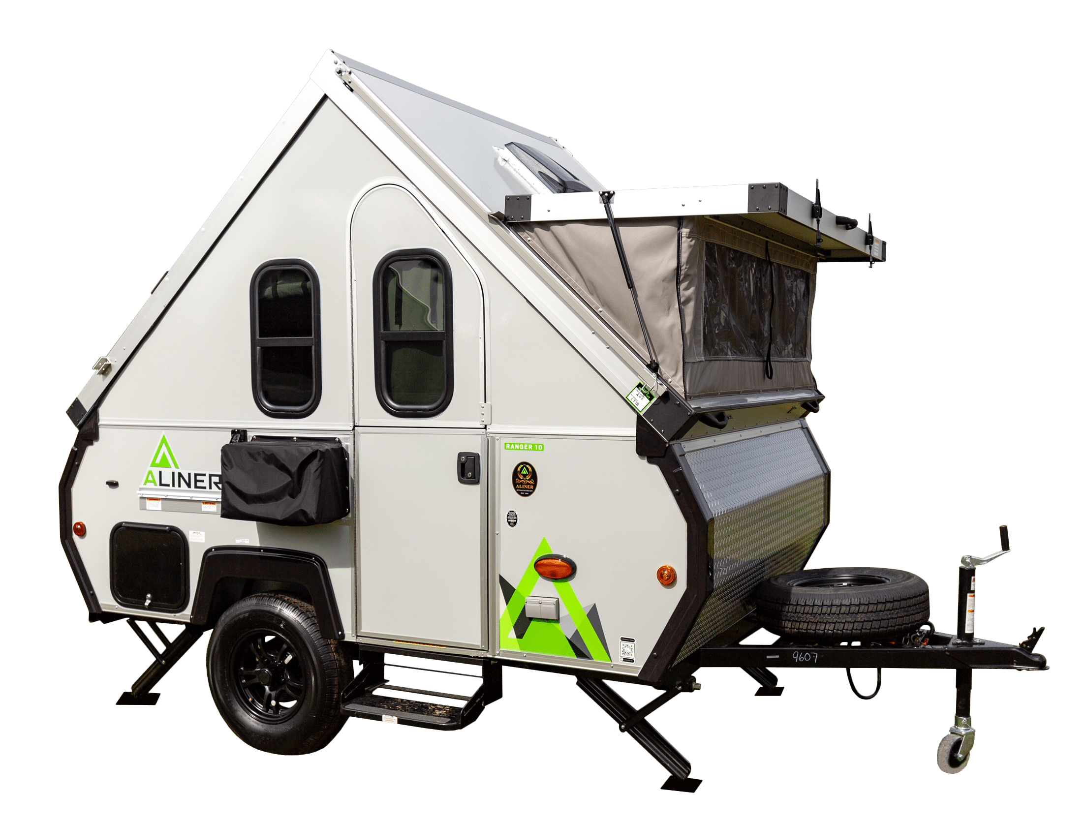 A white camper trailer on wheels.