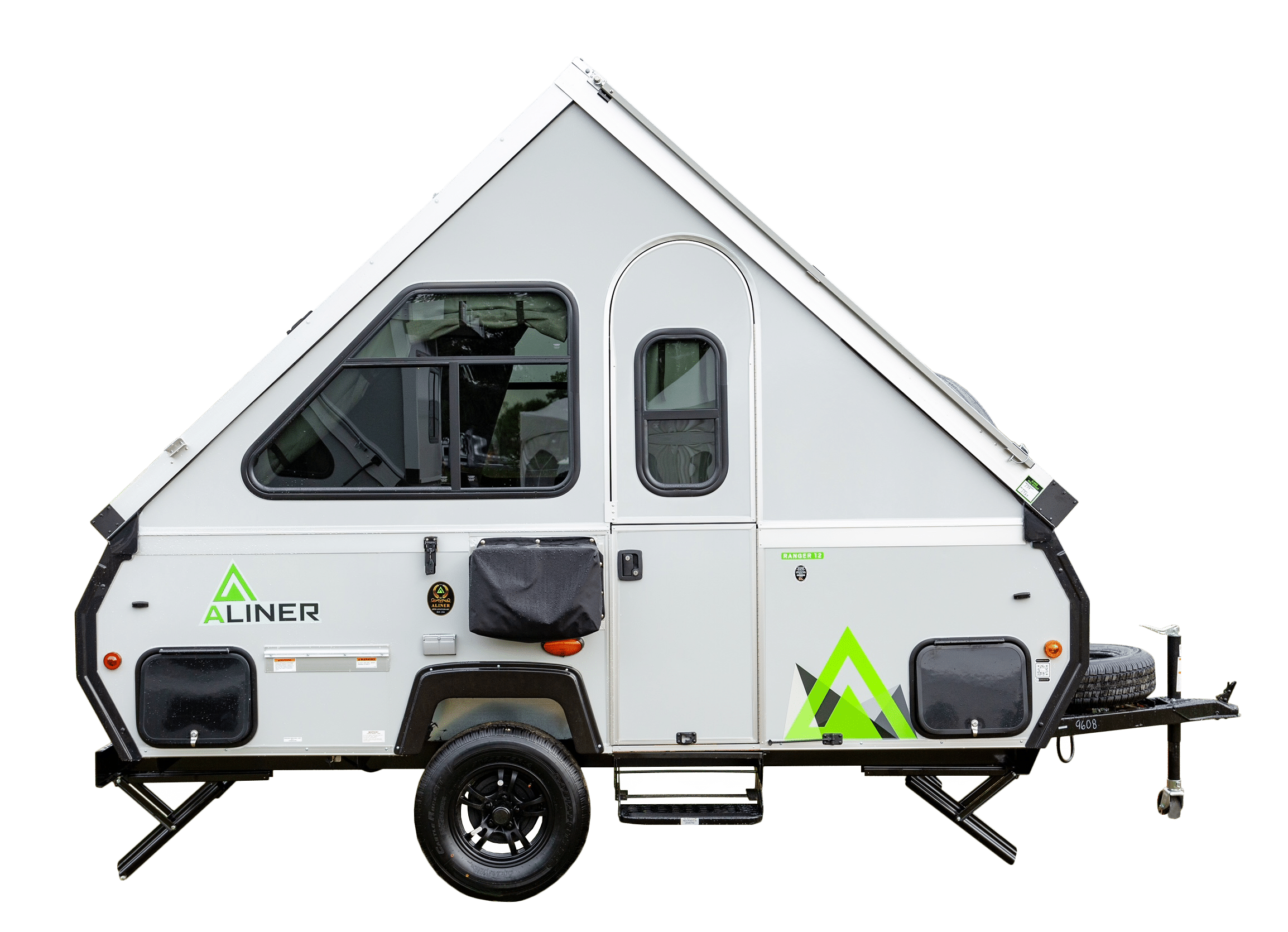 A white camper trailer on a gray background.